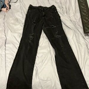 Super cute distressed black stretchy size 9 waist 29 boot cut